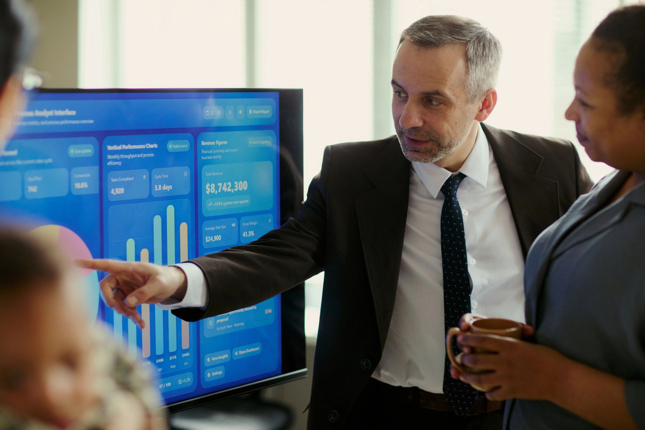 Business leader presenting growth strategy to a team